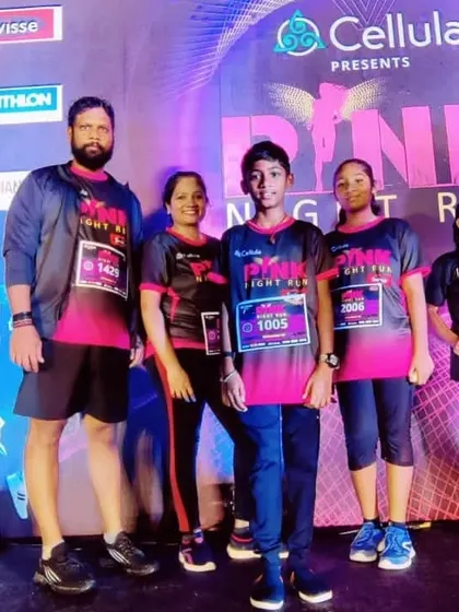 Our Finix runners participating in the midnight Pinkathon. We support important causes and encourage our members to challenge themselves with events like marathons.