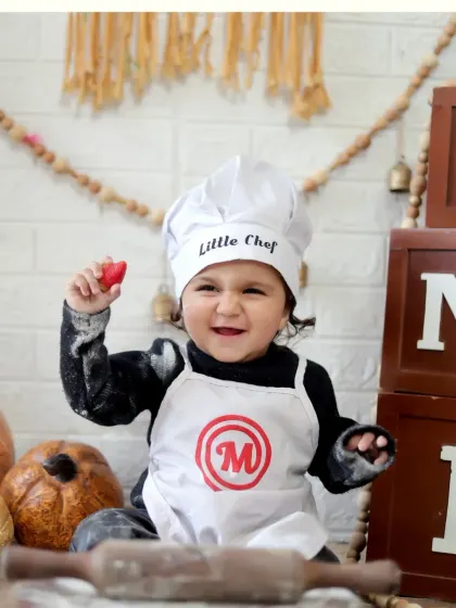 Our 'Little Chef' theme is a recipe for adorable photos. We provide the complete setup with a chef's hat, apron, and playful props to capture your child's delightful expressions.