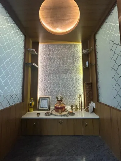 A duplicate of image 125, offering another look at the beautifully detailed interior of the pooja unit.