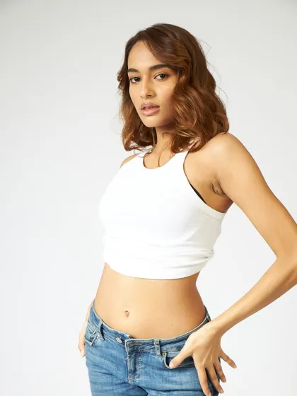 A simple and confident look. The makeup is minimal, designed to enhance features without looking heavy, perfect for a casting or a casual day out.