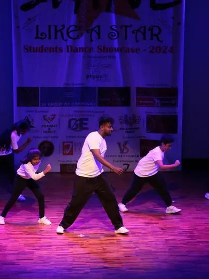 An instructor leading the group in a high-energy routine.