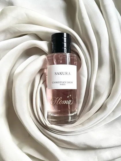 Another shot of the engraved Dior bottle for Hema Malini, styled on a swirl of silk. The simple, elegant script is timeless.