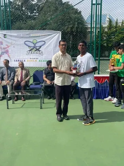 Receiving the finalist trophy at the CISCE Regionals. Each tournament provides valuable experience for our players as they climb the competitive ladder.