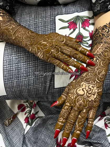 The back of the hands is just as important. Here is a full back-hand bridal design with custom calligraphy.