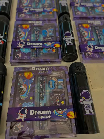 We also offer individual stationery sets as return favors. This "Dream Space" set is perfect for budding astronauts and comes with a matching water bottle.