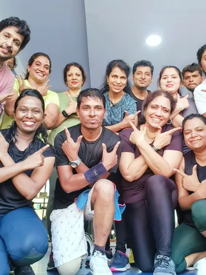 Striking a powerful pose after a great class. This group is full of strength, energy, and personality.