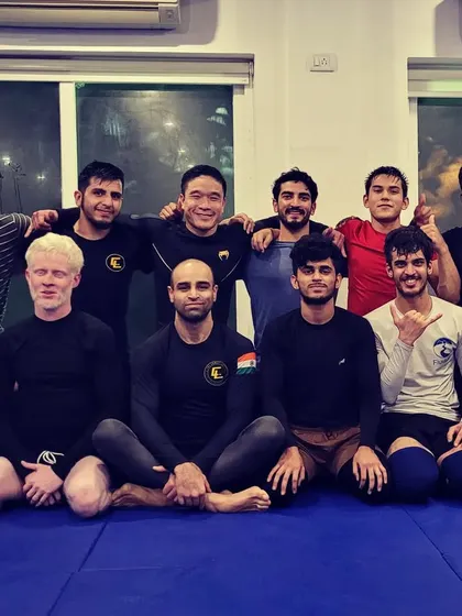 Our philosophy is built on technique over brute force. This picture captures the spirit of our team, where we focus on leverage and timing to overcome any opponent. It’s a thinking person’s game, and we train your mind as much as your body.