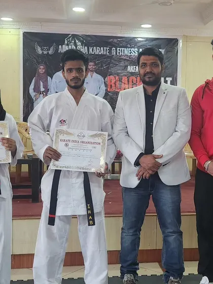 Another photo celebrating our new black belts. Their success is a proud moment for the entire AKFA family.
