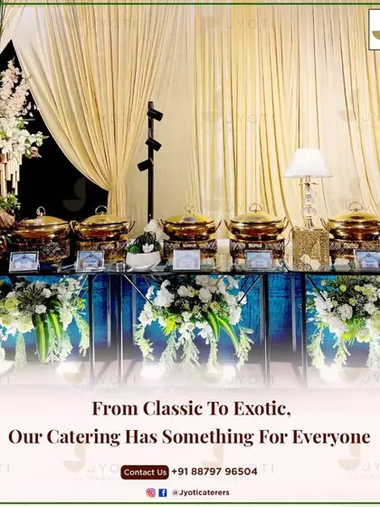 This modern buffet line uses clean lines, elevated floral arrangements, and a mix of brass and glass serveware for a sophisticated look.