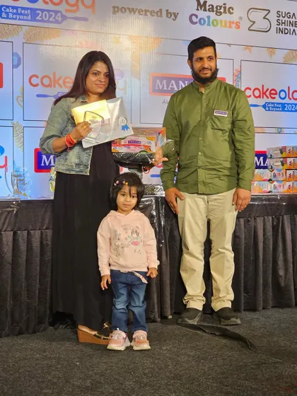 On stage with my family to accept my award. Their support is the secret ingredient in all of my success.