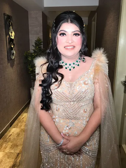 A smiling shot of my engagement stunner in her golden gown.