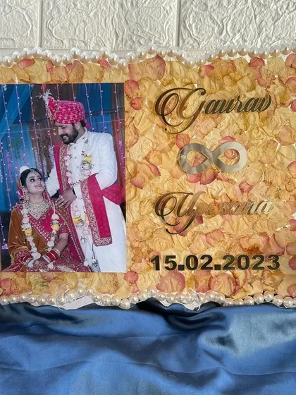 This full view shows how the couple's photo, names, and wedding date are beautifully integrated into the floral background.