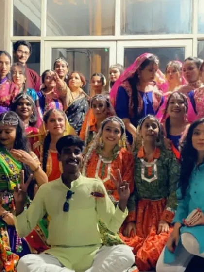 Another moment with the folk dance team, capturing the energy and camaraderie before a performance.