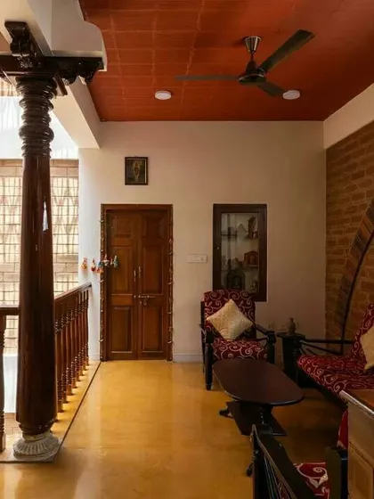 A duplicate image of the upper-level seating area, reinforcing the importance of traditional elements like antique pillars in the design.