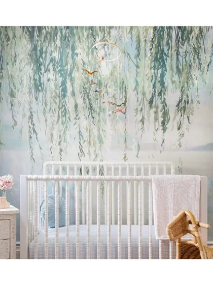 For a nursery or child's room, a scenic wallpaper like 'Serenity' creates a calm and magical environment. The digitally printed willow leaves offer a gentle, textured backdrop for a peaceful space.