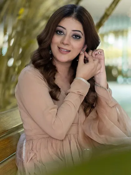 A smiling portrait that captures a moment of genuine happiness. This kind of image is perfect for creating a relatable and engaging social media presence.
