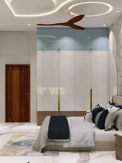 The wardrobe in this bedroom uses a two-tone finish of white and wood, with a touch of blue, to create a light and modern feel.