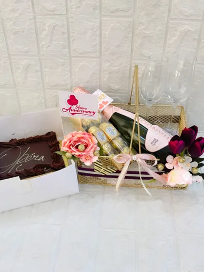 A full view of the anniversary gift set, including a decadent chocolate opera cake, making the celebration even sweeter.