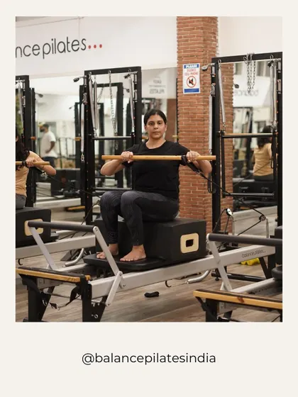 Using the short box and pole for a seated row, this exercise is fantastic for posture and upper back strength.