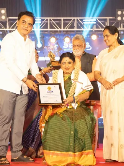 A moment of honour at the Shivaratri Utsava award ceremony. Such recognition from the community is always a great source of encouragement.