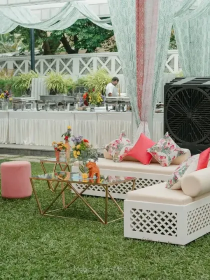 A vibrant and comfortable lounge area for the Mehendi. We paired colorful floral tablecloths with elegant seating and soft drapes to create a space that was both festive and relaxing for guests.