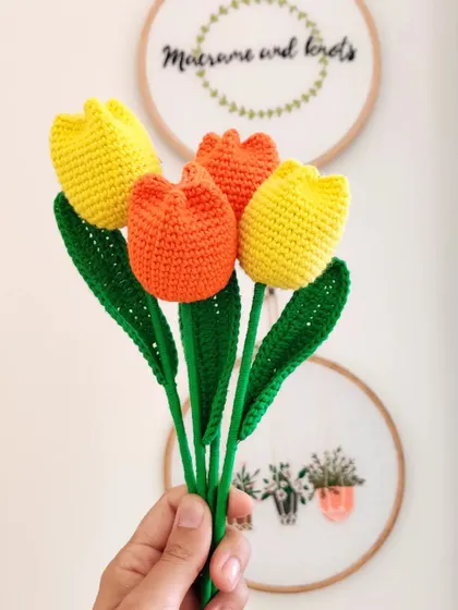 A small, bright bunch of classic crochet tulips in yellow and orange. I can customize these in any color you like to brighten up your day or to give as a thoughtful gift.