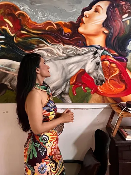 A profile view of a visitor admiring the details in my "Soulmates" painting. The textures and fine brushwork are best appreciated up close.