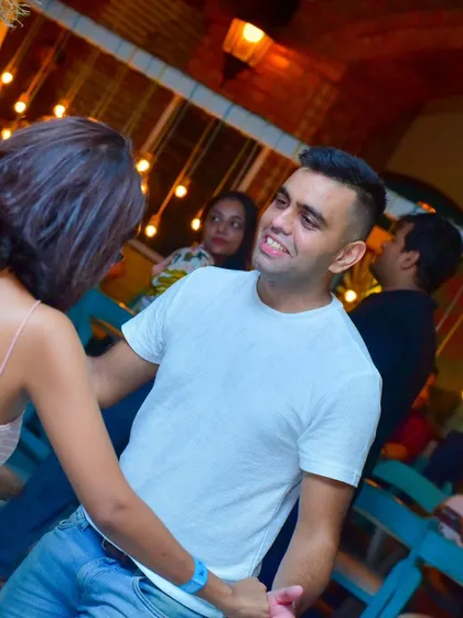A fun and energetic moment on the dance floor.