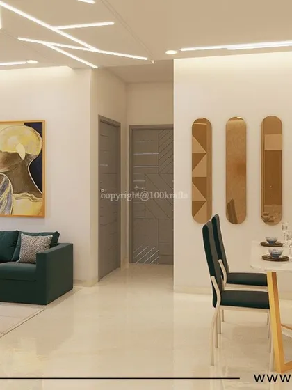 The open-plan living and dining space at 'Konark Oasis'. The design uses modern art, unique mirrors, and a consistent color scheme to create a cohesive and stylish home.