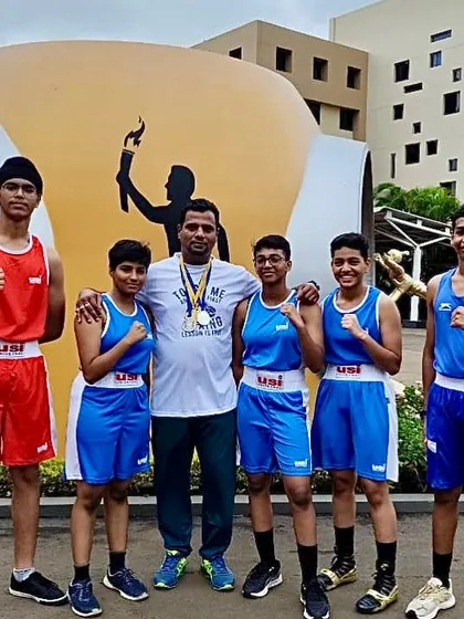 The team of five boxers with me after a successful tournament at the CBSE South Zone II championships.