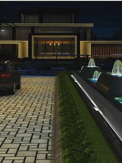 A perspective simulation of the clubhouse driveway, showing how pathway lighting, illuminated water features, and architectural highlights work together. The design guides visitors while creating a memorable first impression.