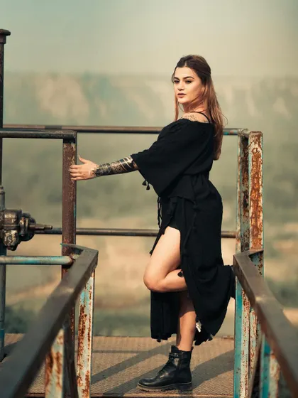 An identical shot to the previous one, emphasizing the strong composition and mood. This location was a fantastic find for an edgy, industrial-meets-nature shoot.