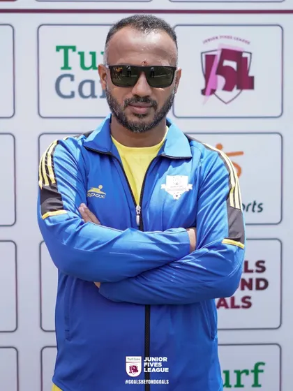 Cool, calm, and collected. This coach brings a steady presence to the sidelines of the J5L.