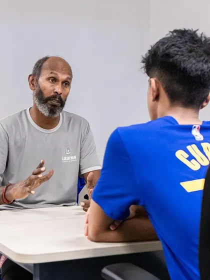 Mental training is a key component of our high-performance camps. Here, a young basketball player receives a personalized counseling session to develop a champion's mindset, improve focus, and handle pressure.