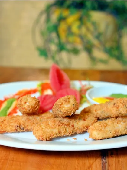 Our crispy fried fish fingers are a great appetizer to share with friends.