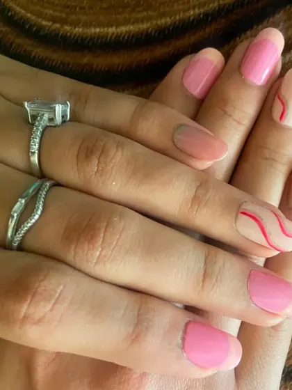An example of a chic design on short, natural nails. This shows that beautiful nail art isn't just for long extensions.
