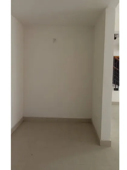 **BEFORE:** A small, empty nook at the entrance of the home, which was undefined and served no practical purpose.