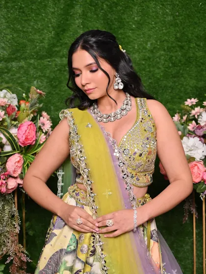 A candid shot of the Mehendi look, highlighting the intricate jewelry and the flawless makeup.