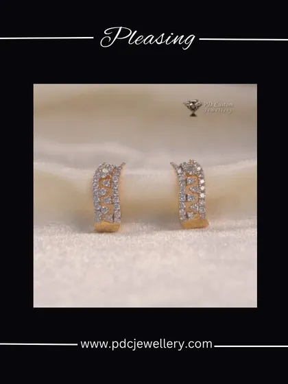 A pleasing pair of 18kt hallmarked gold and diamond huggie earrings. The checkered pattern of diamonds adds a modern, geometric touch to this everyday essential.