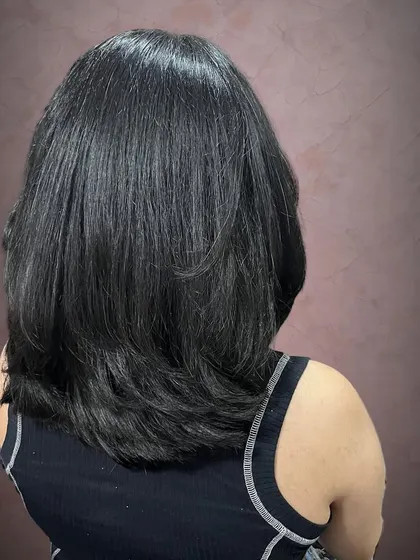 The back view shows the soft, blended layers.