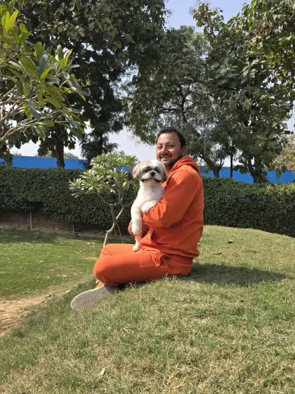 A happy, smiling dog is the best feedback I can get. This photo captures the trusting relationship I build with each bachha that stays with me.