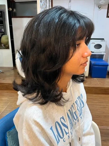 The side view shows the texture and layers of the shag.