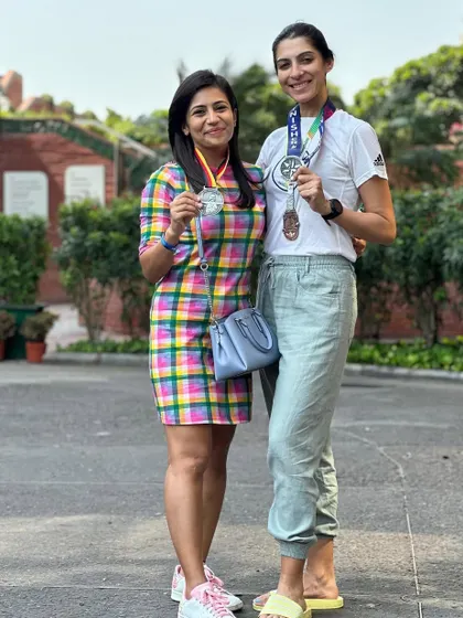 A duplicate of image 110. Celebrating with a friend who also completed a World Major Marathon. We share a bond forged through miles of training.