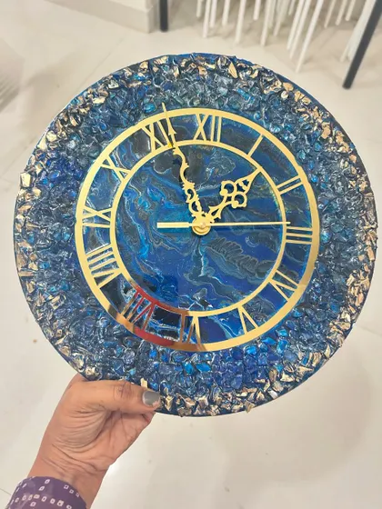 This stunning geode-style wall clock was created in our workshop. Participants learn to use crystals and metallic pigments to mimic the look of natural agate slices.