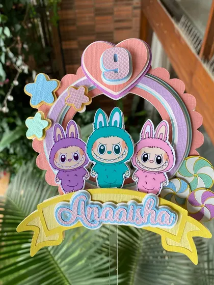 We hopped on the Labubu trend with this adorable handmade topper. The cute monster characters and pastel colors make it a fun and unique choice for a 9th birthday.