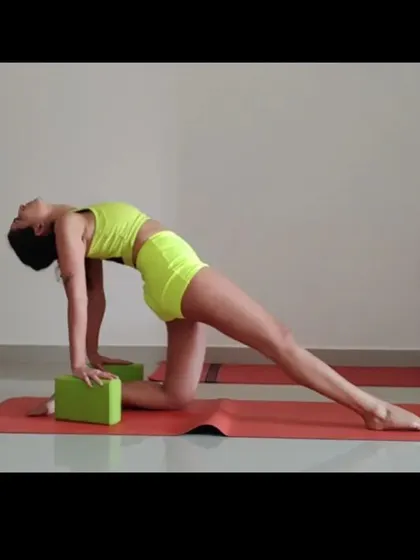 A supported backbend pose using blocks. This variation helps to build strength and confidence for deeper heart-opening postures.