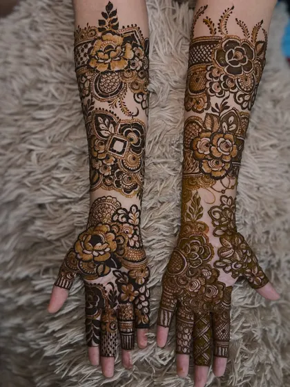 A full view of the engagement floral design on both arms. The patterns are carefully mirrored for a balanced and symmetrical appearance.