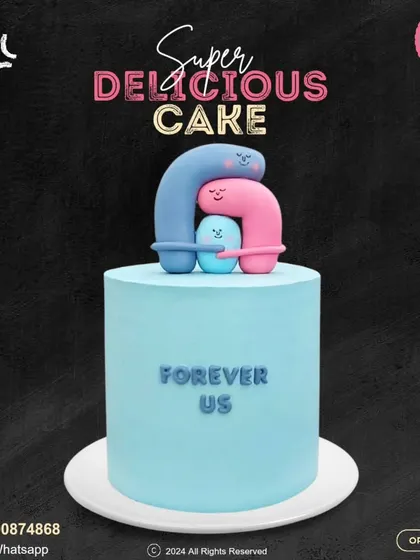 "Forever Us." This simple and sweet light blue cake is topped with an abstract representation of a loving family, making it a perfect choice for an anniversary or family celebration.