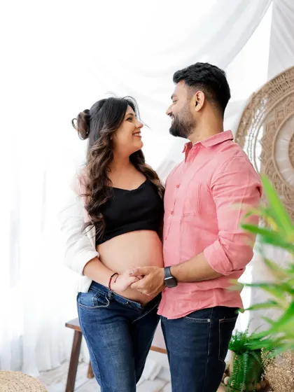 A sweet and casual couple's portrait. Their happy smiles and the way they look at each other perfectly capture their love story.