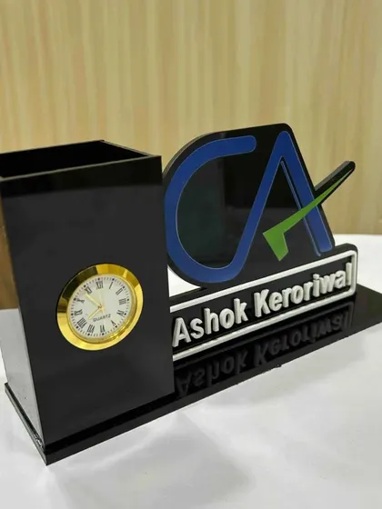 A personalized pen stand for a Chartered Accountant, customized with the CA logo and name.